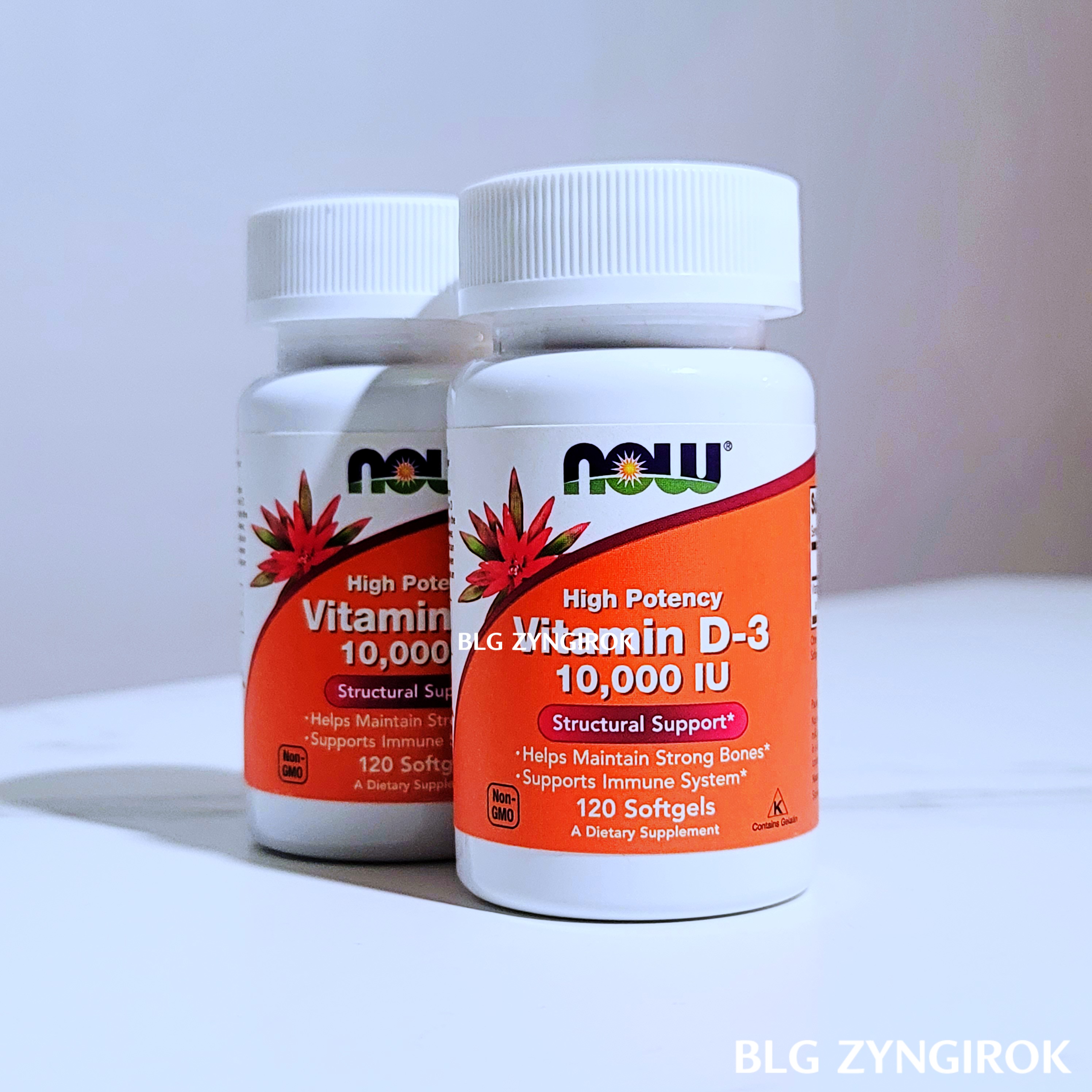 나우-비타민d-두통이-테이블-위에-놓여있다.