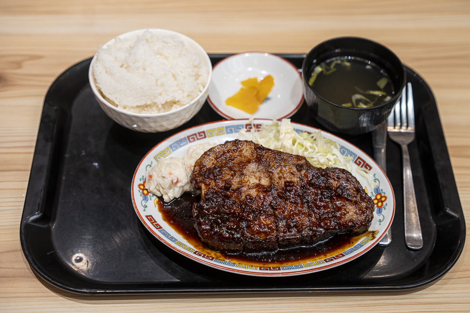 Ruki — Ekimarche Osaka: A meat dish with sauce, alongside rice and soup.