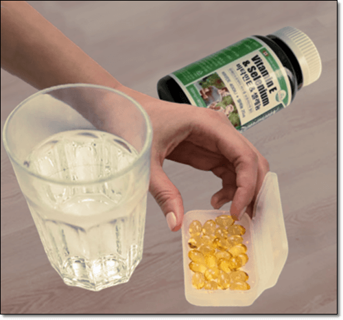 토코페롤 복용하는 여성