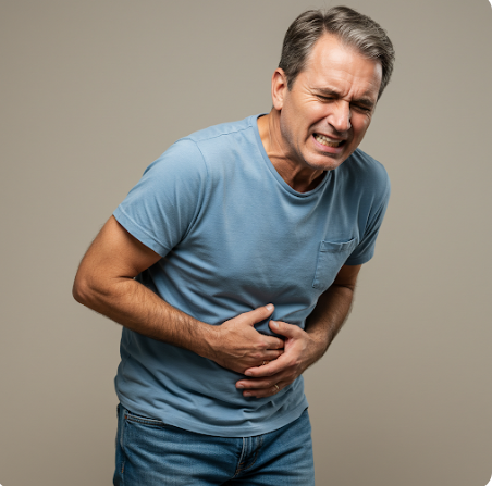 배가 아파서 괴로워 하는 남자