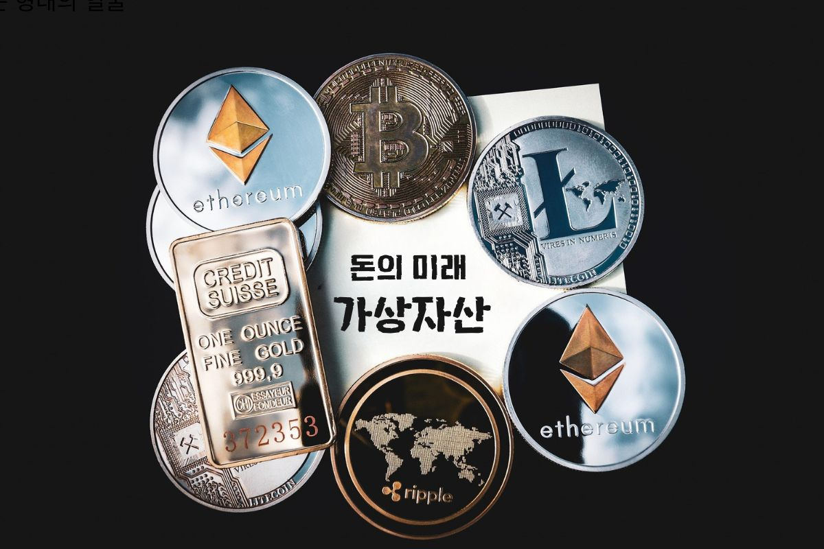 이더리움, 비트코인, 리플 등 가상화폐 로고 코인 이미지가 모여 있는 장면, 가상자산 시대를 상징