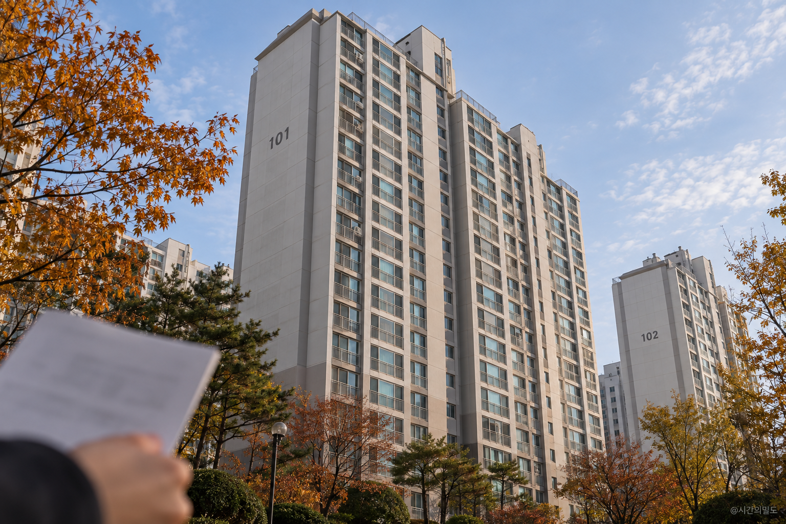 동 표시가 보이는 국내 아파트 외관을 아래에서 바라본 생성 이미지