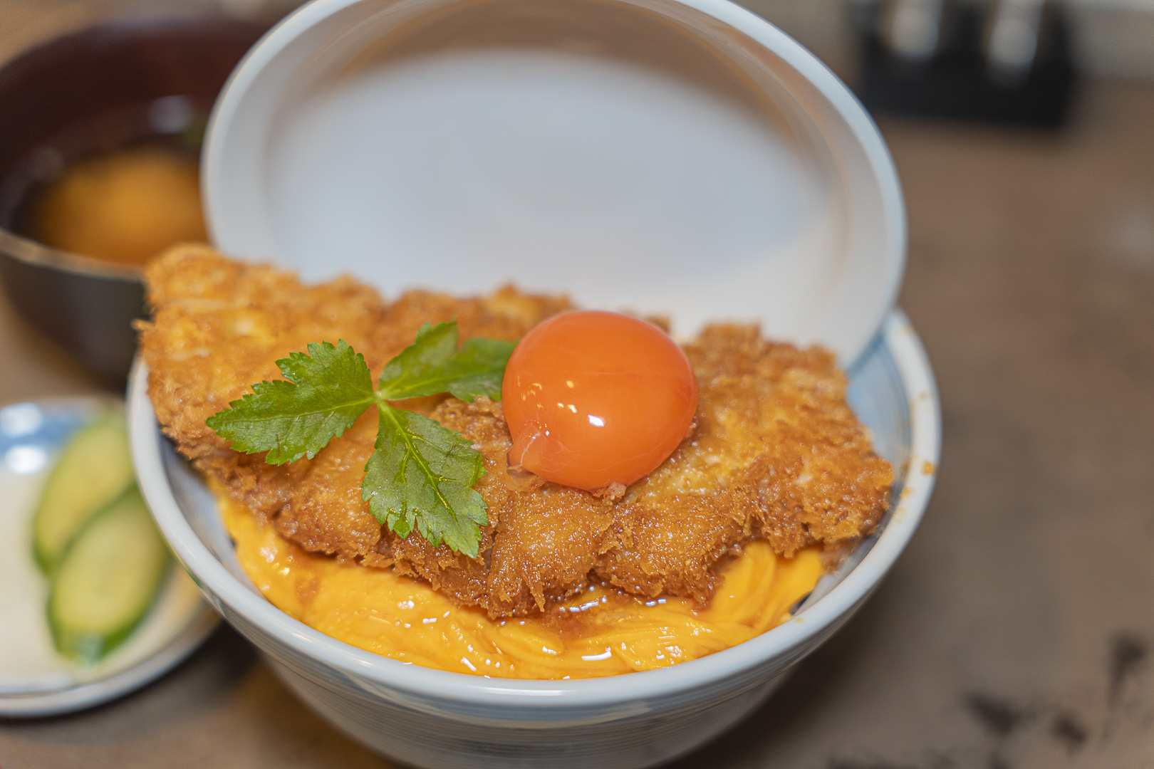 A yolk-topped cutlet dish at Tonkatsu Shirokichi