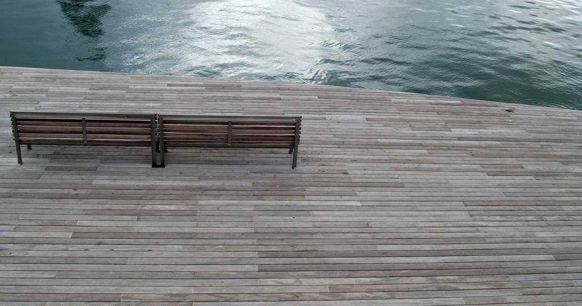 person creating digital art on a tablet with AI tools, futuristic and vibrant