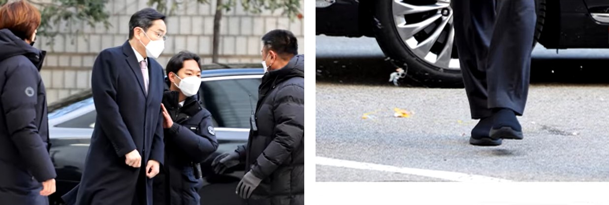 이재용 회장이 법원 출석 중 날아온 계란에 놀라고 있다
