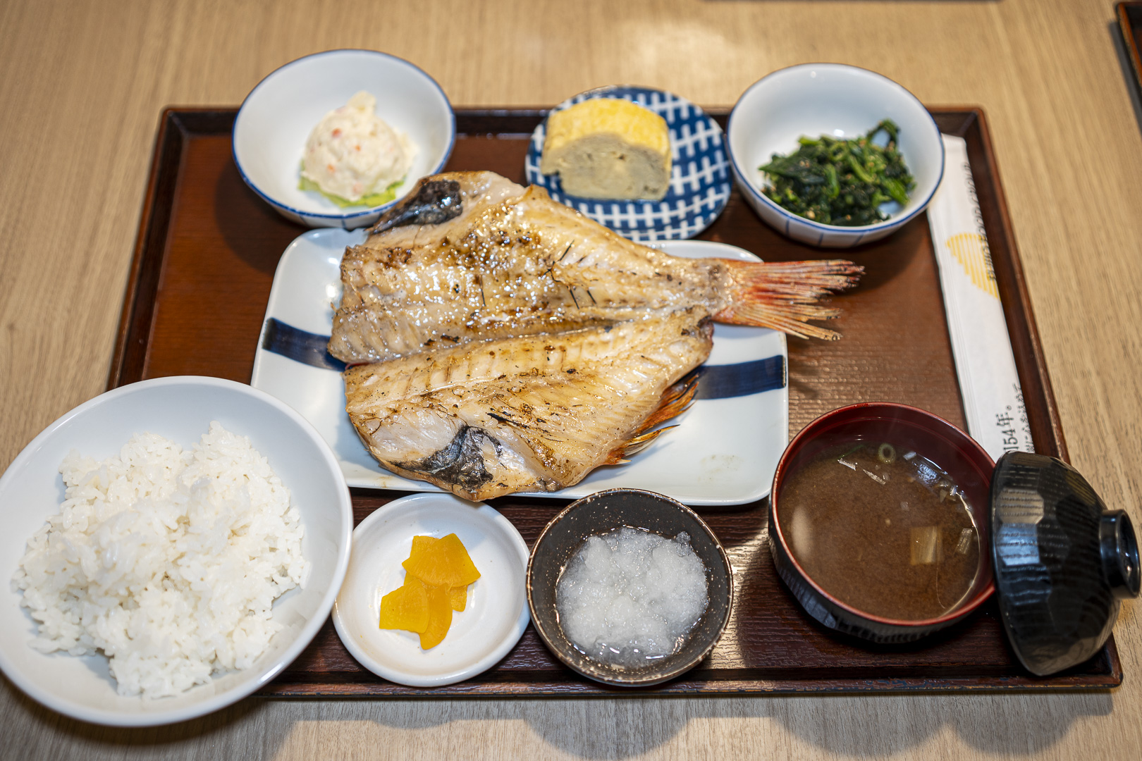 Shinsaibashi Shokudo — Grilled Fish and Pot-cooked Rice: A set meal of grilled fish, rice and soup.