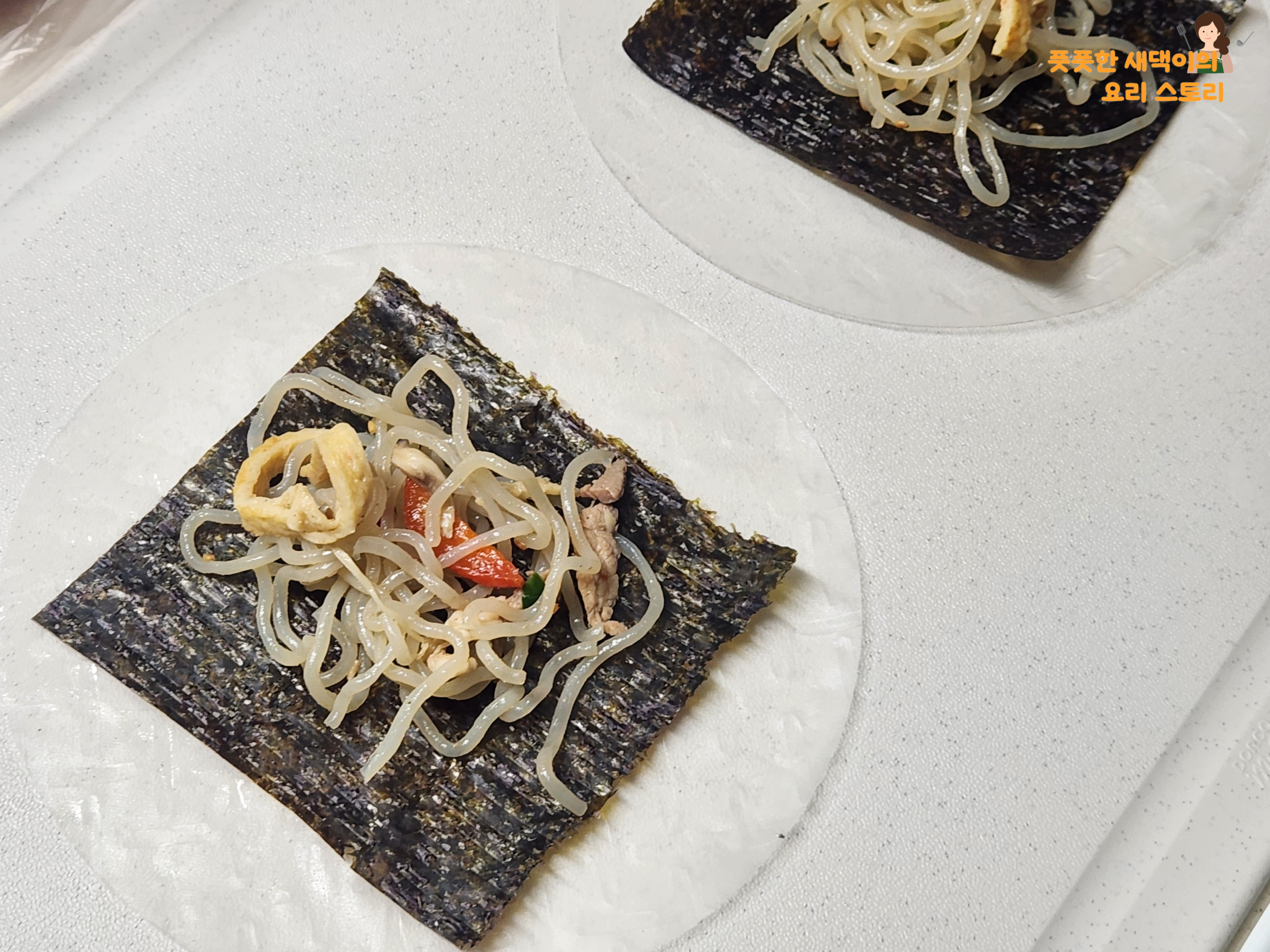 김위에 당면 올려주기