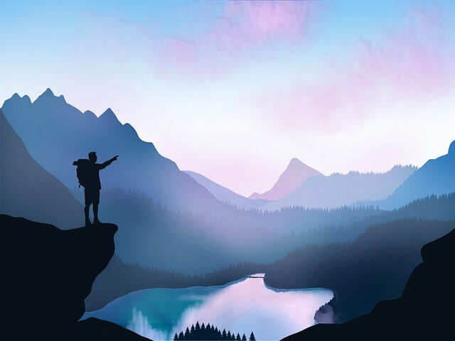 산 정상에 서 있는 사람 이미지