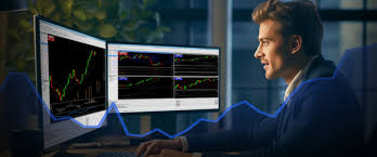 남자가 주식 차트를 분석하고 있는 모습