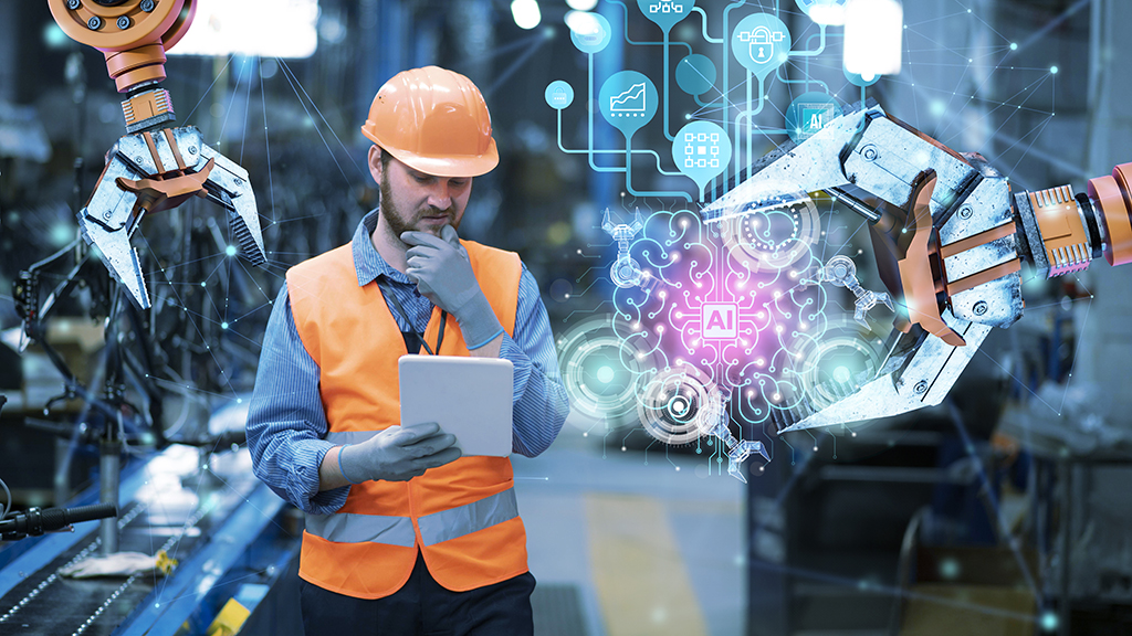 산업용 기계와 안전복 차림의 사람이 함께 있는 이미지