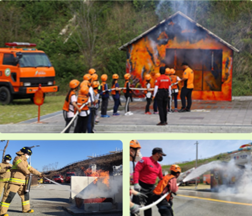 제2회 프로미 119 안전리더 캠프에 참가한 학생들이 소방관들과 함께 화재 진압 훈련을 하고 있는 모습