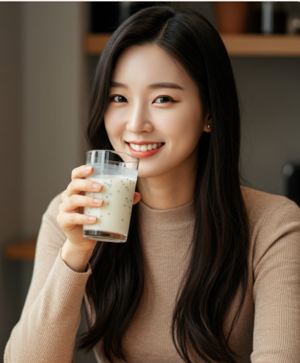 홍화씨 분말로 물에 타 먹는 여성