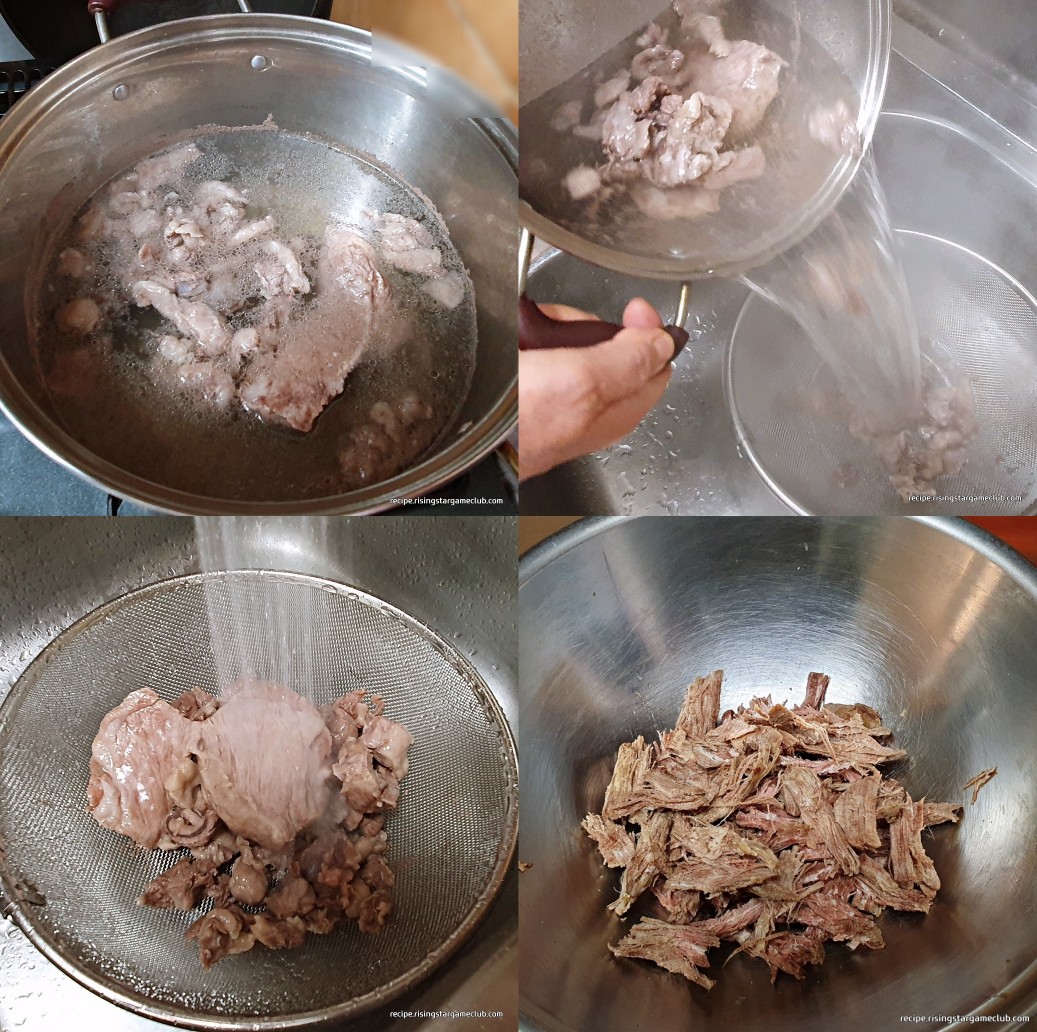 육개장에 넣을 소고기를 끓여서 핏물을 제거하고 찬물에 씻어 고기를 잘게 찢어 놓은 사진