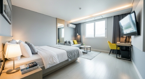 모던 스타일 모텔 객실&amp;#44; 청결하고 정리된 침대