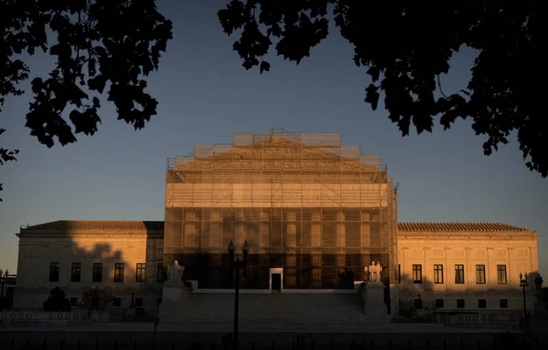 The Supreme Court heard arguments Wednesday over President Trump’s tariffs. Mark Schiefelbein/Associated Press