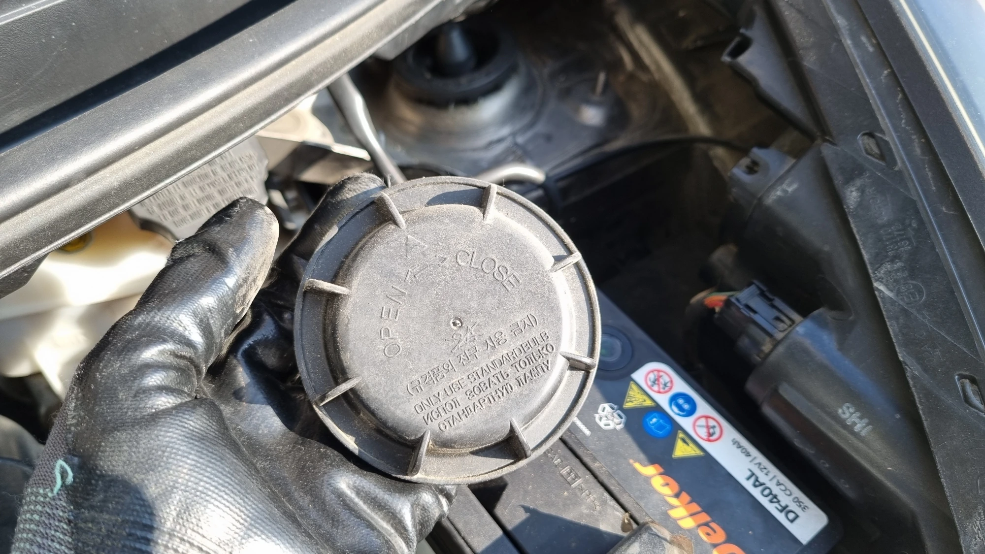 모닝 상향등 커버 열린 모습