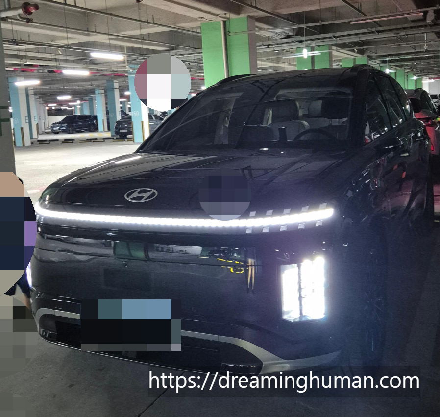 2025 현대 아이오닉9 전면 전체 모습, 미래지향적인 디자인과 LED 헤드램프가 돋보이는 전기 SUV