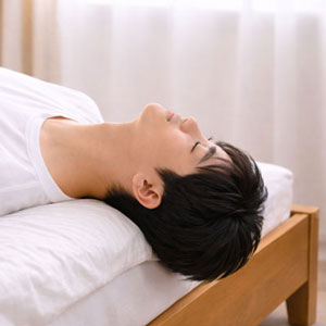 이석증 자가치료법 - 침대 끝에 눕기