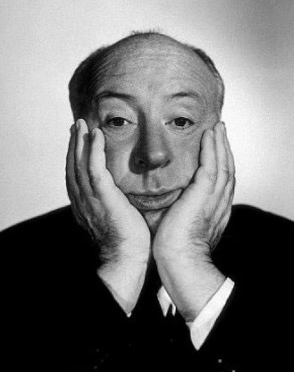 꽃받침을 하면서 사진을 찍은 알프레드 히치콕