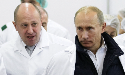 하얀 옷을 입은 프리고진-검은 옷을 입은 푸틴대통령