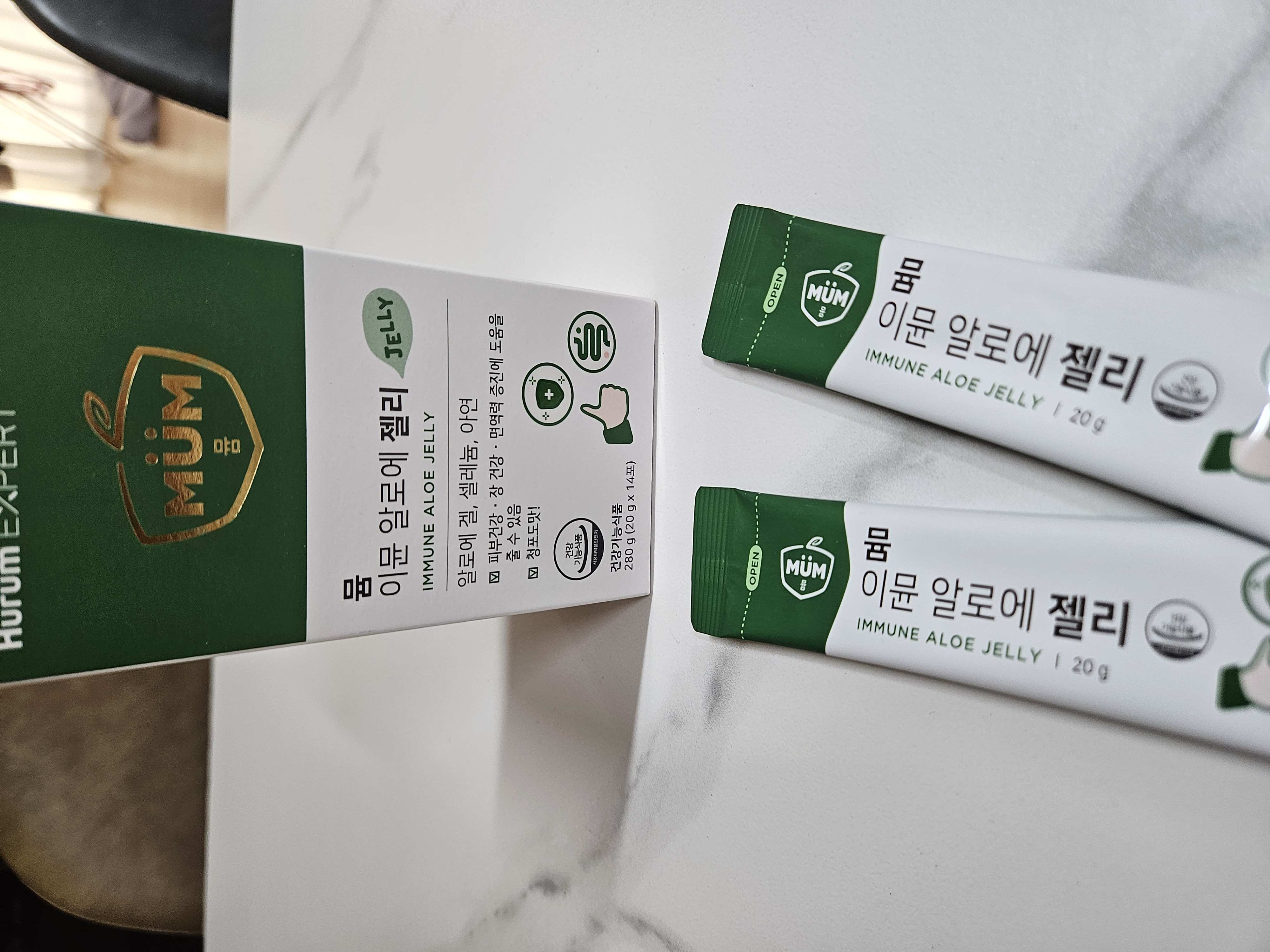 뮴 이뮨 알로에 젤리 박스와 젤리스틱 사진
