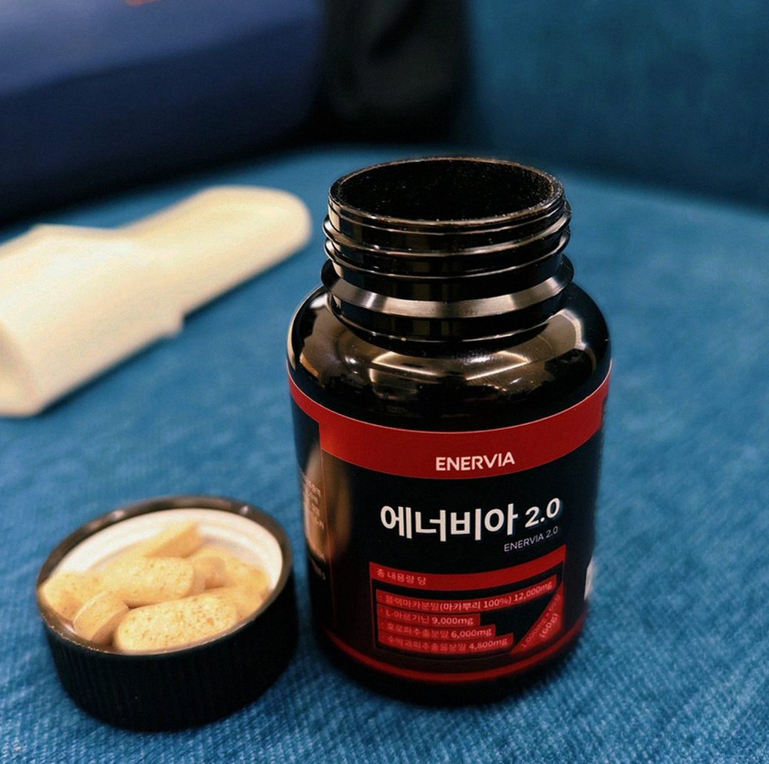 Korean Asian man in his 40s drinking protein shake after workout gym