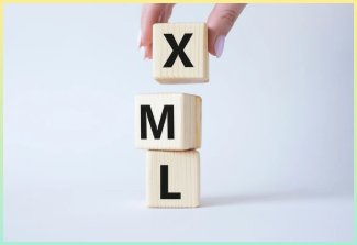 XML - 확장 가능한 마크업 언어. 단어 XML과 나무 큐브. 사업가의 손. 아름다운 흰색 배경. 비즈니스 및 확장 가능한 마크업 언어 개념 공간을 복사.