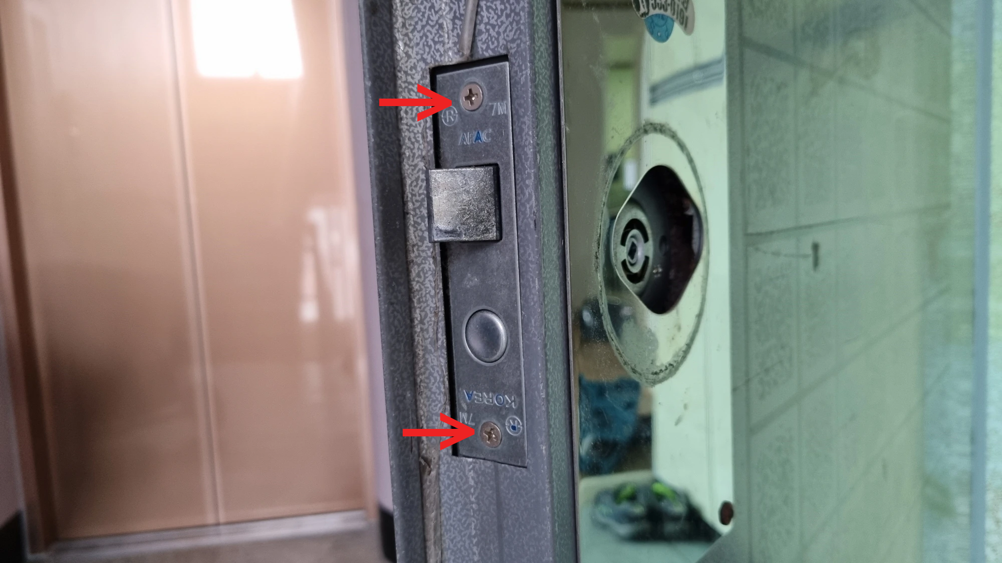 현관문 손잡이 걸쇠 장치