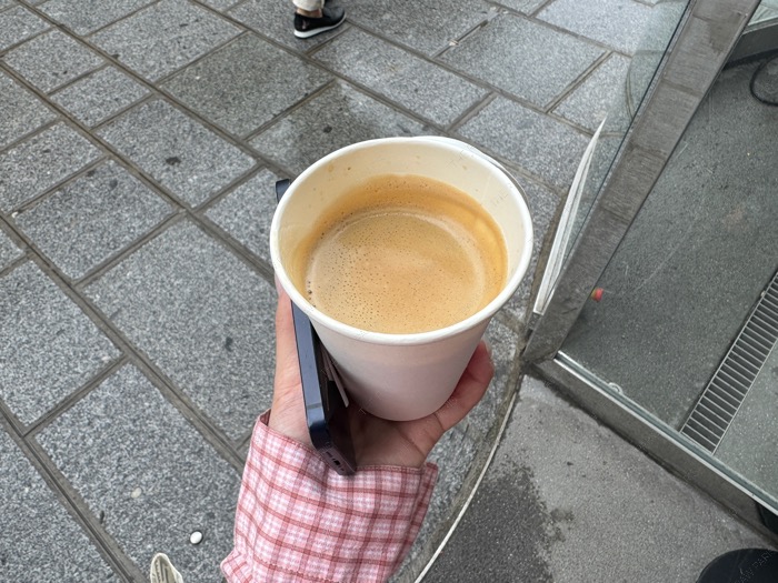 paris takeaway coffee cup walking street lifestyle