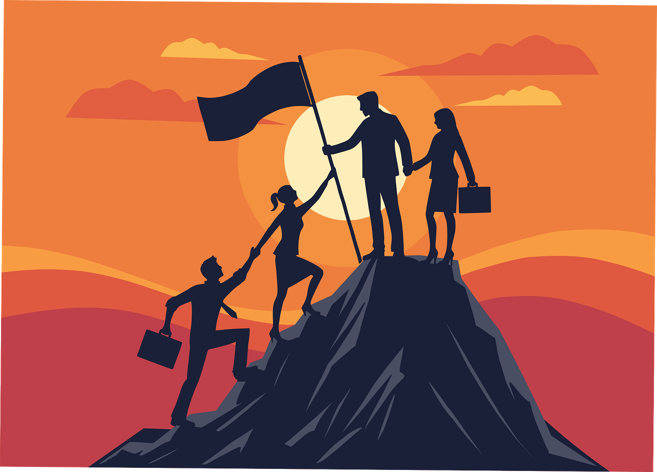 산 정상에서 팀을 이끄는 리더 이미지