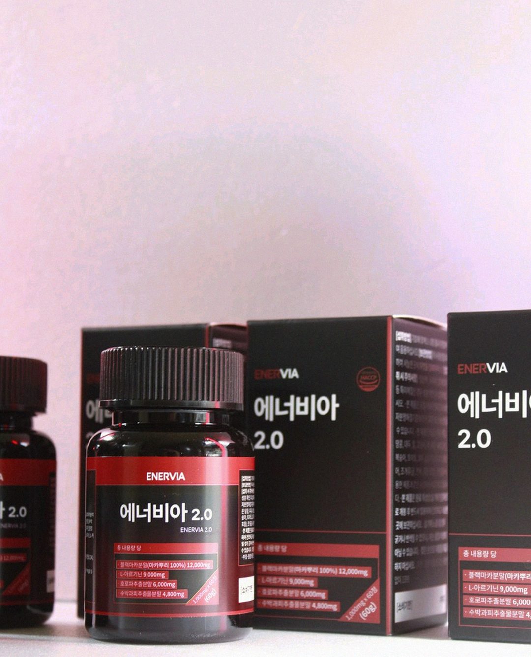 Korean Asian man organizing supplements at desk