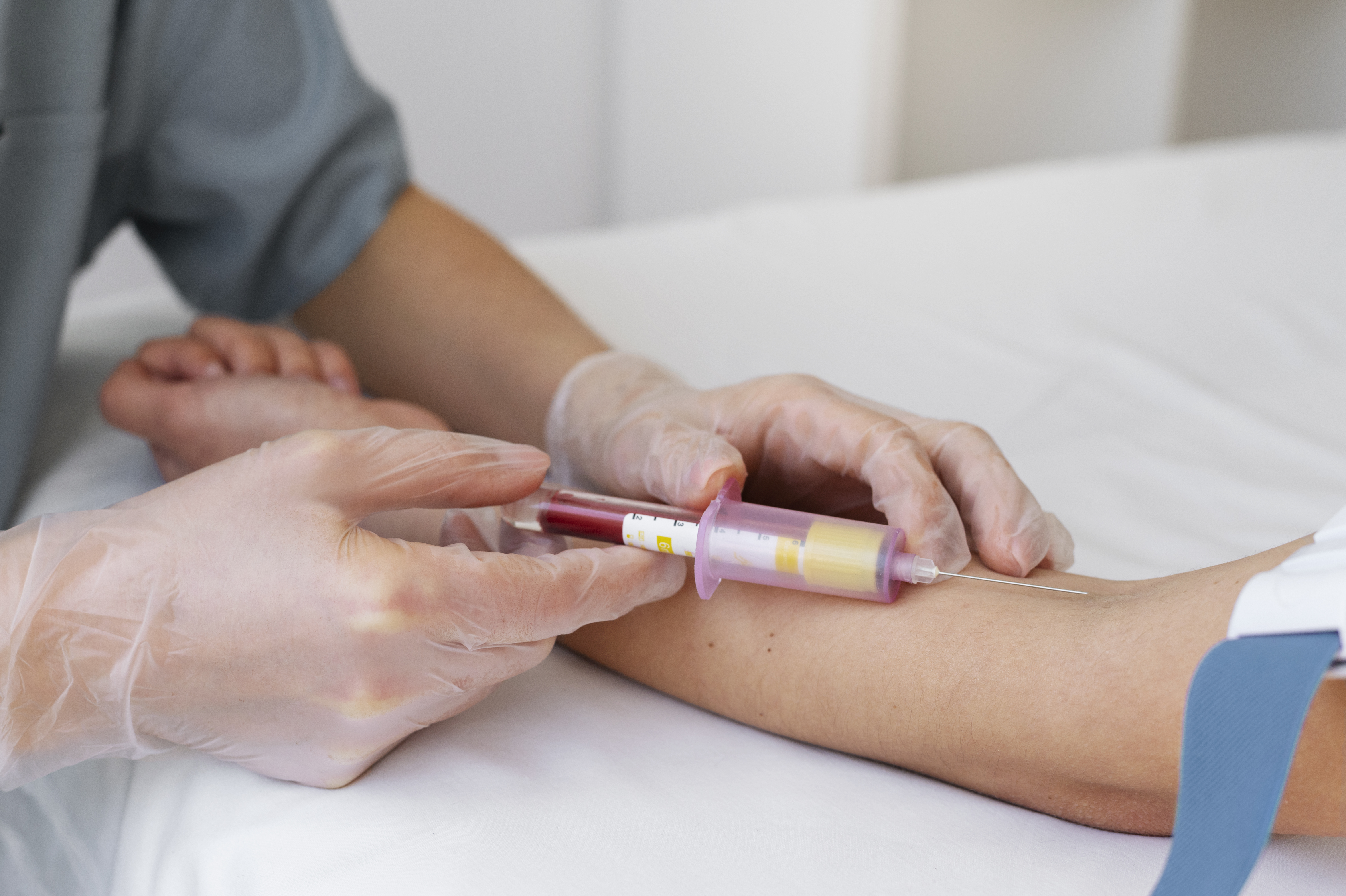 side-view-healthcare-professional-drawing-blood.jpg
