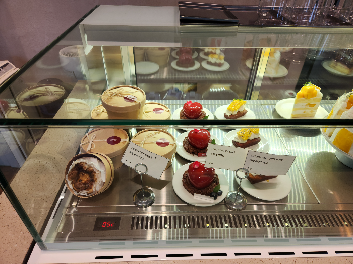 There are many cakes on a plate on the table.