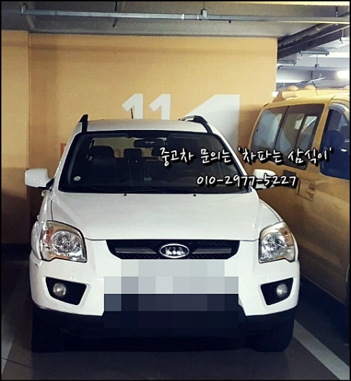 뉴-스포티지-흰색-디젤-차량-앞모습