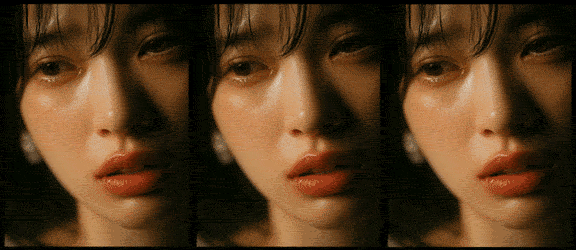 억누르던 슬픔이 줌인 효과와 미세한 떨림을 통해 감정의 동요로 이어지는 영상_Midjourney