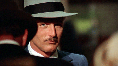 영화 스팅에서 헨리 곤돌프 역할로 나온 폴 뉴먼의 모습