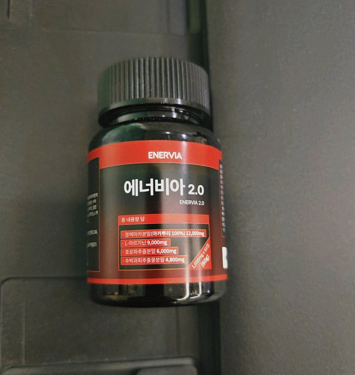 Korean Asian woman nurse preparing for night shift with supplement routine