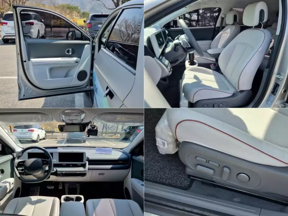 다크 틸 인테리어로 꾸며진 아이오닉 5의 앞좌석입니다.