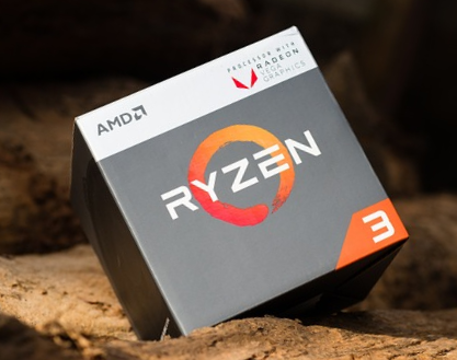 A box of AMD&#39;s processor Ryzen sits on a rock