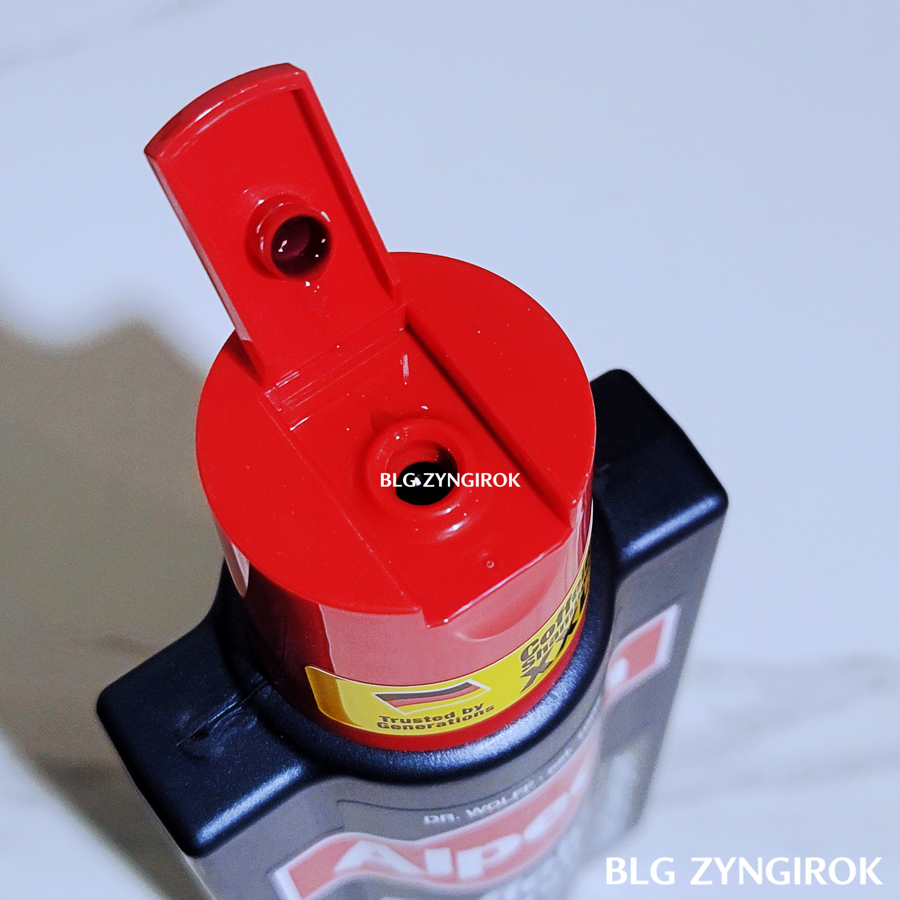 알페신 샴푸 뚜껑을 연 모습이다.