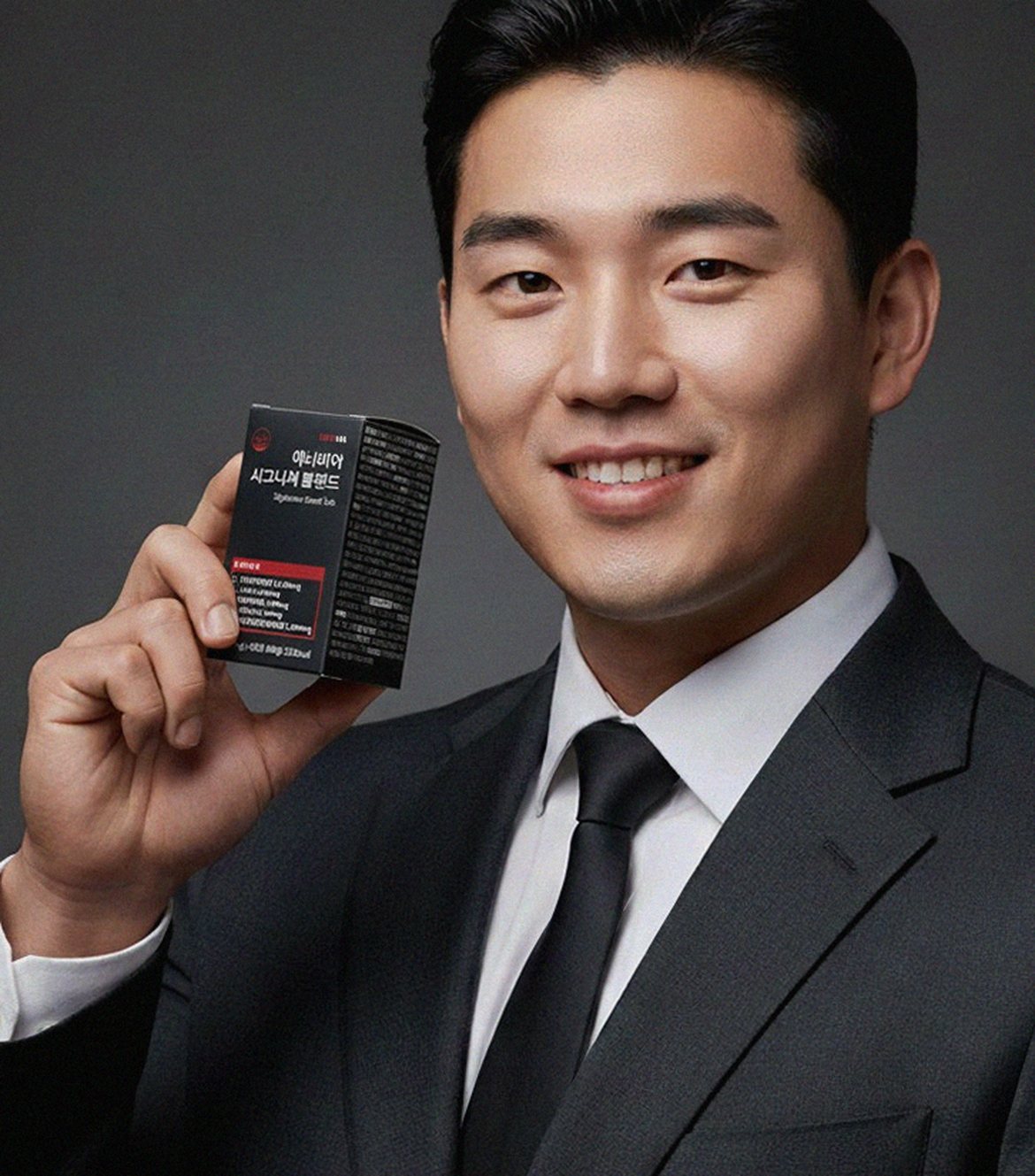 Korean Asian man taking supplement in gym locker room