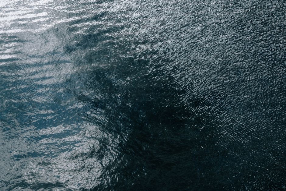Peaceful ocean surface with gentle ripples, perfect for backgrounds and design uses.