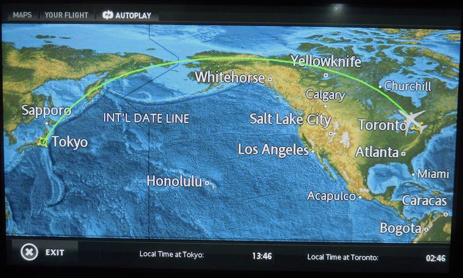 screen of in-flight entertainment, showing the flight path between the origin (Toronto) and destination (Tokyo)