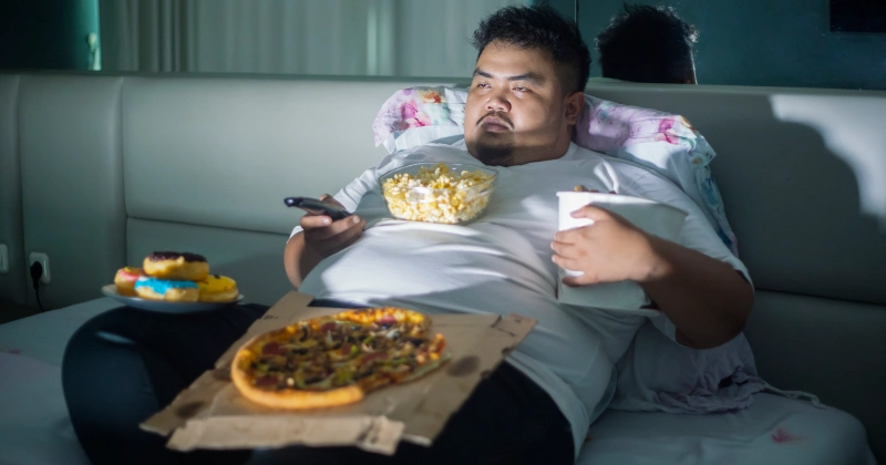 tv 보고 있는 비만인