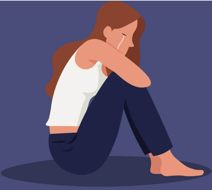 배가 아파서 울고 있는 여성