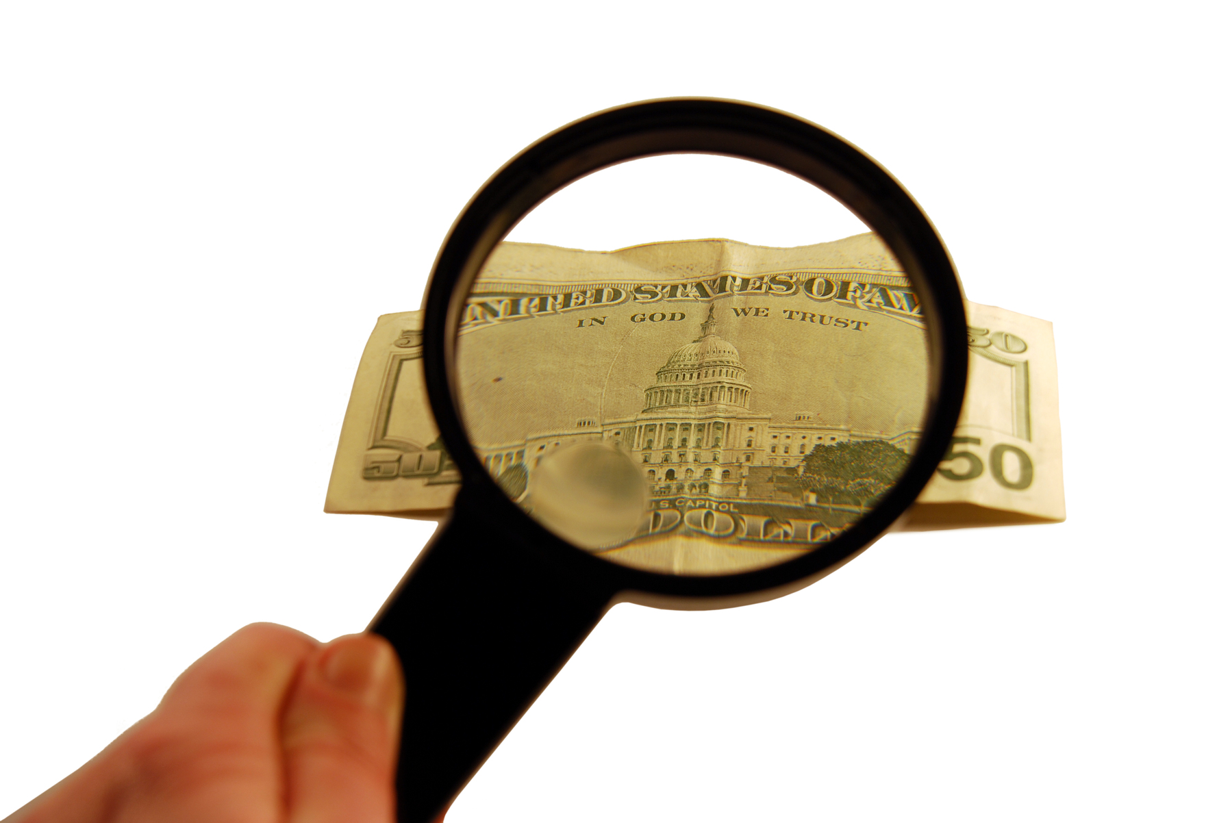 돋보기로 지페를 보고 있는 이미지