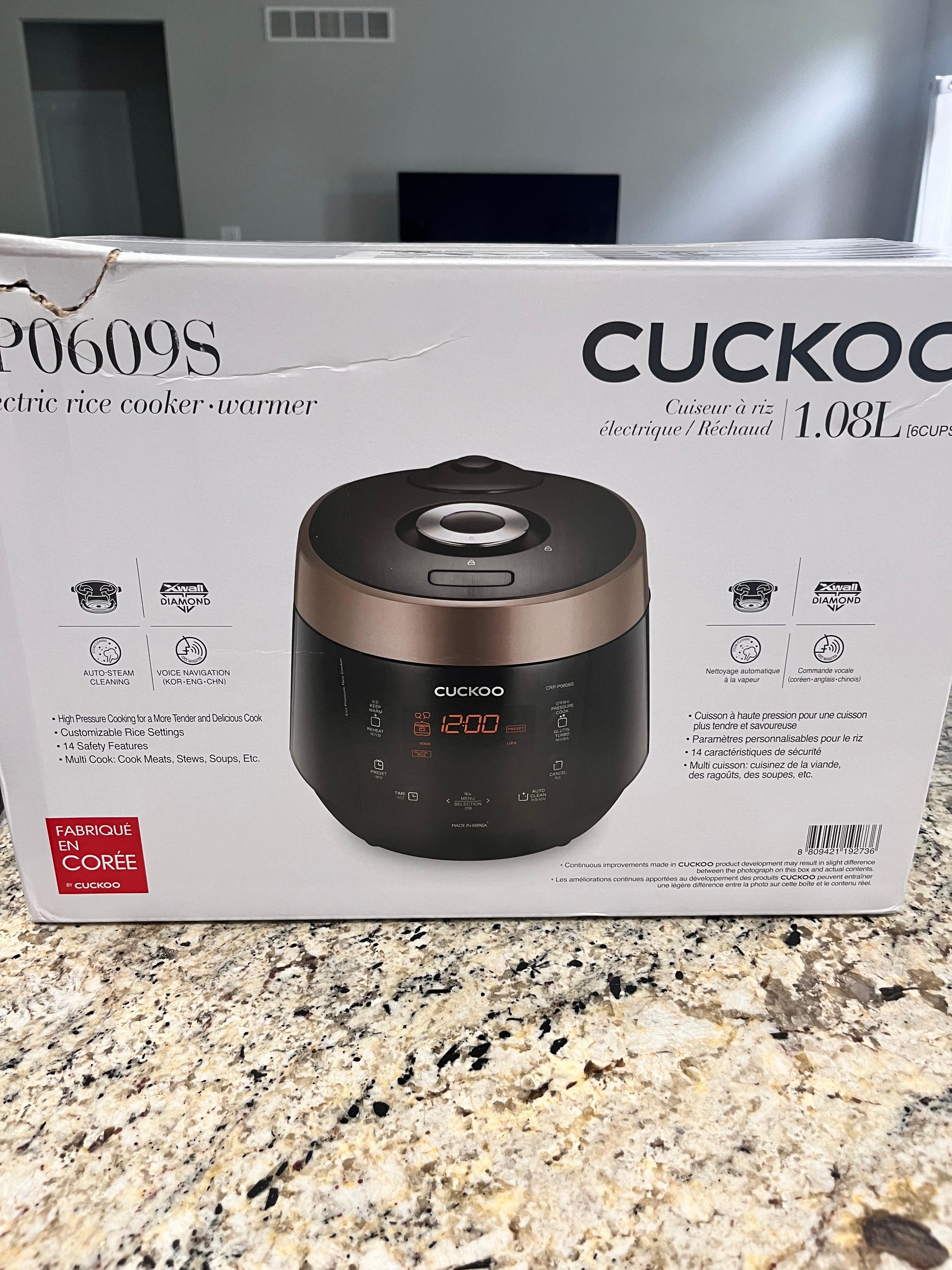 쿠쿠 압력 밥솥이 그려져 있는 박스가 있는 이미지