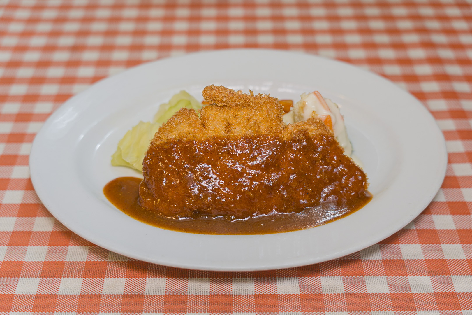 A sauced cutlet at Grill Jujiya