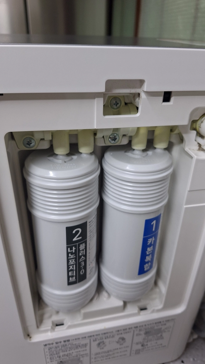 쿠쿠정수기-새필터-교체완료