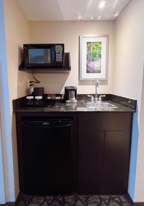 Microwave and minibar area inside Embassy Suites Niagara Falls room